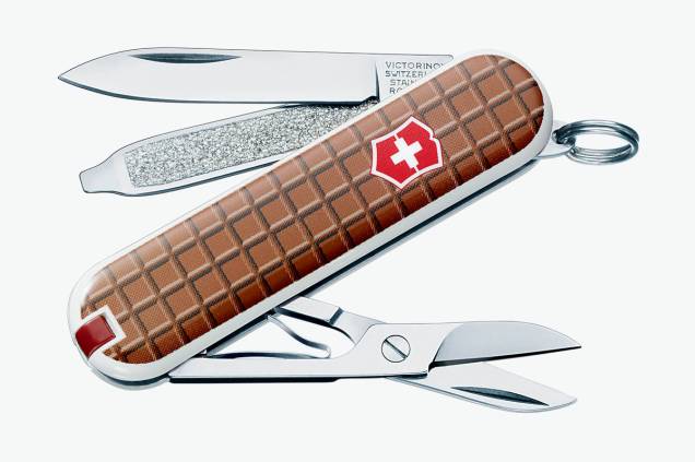 Canivete suíço com sete funções e estampa de chocolate: R$ 113,00 Canivete suíço com sete funções e estampa de chocolate: R$ 113,00