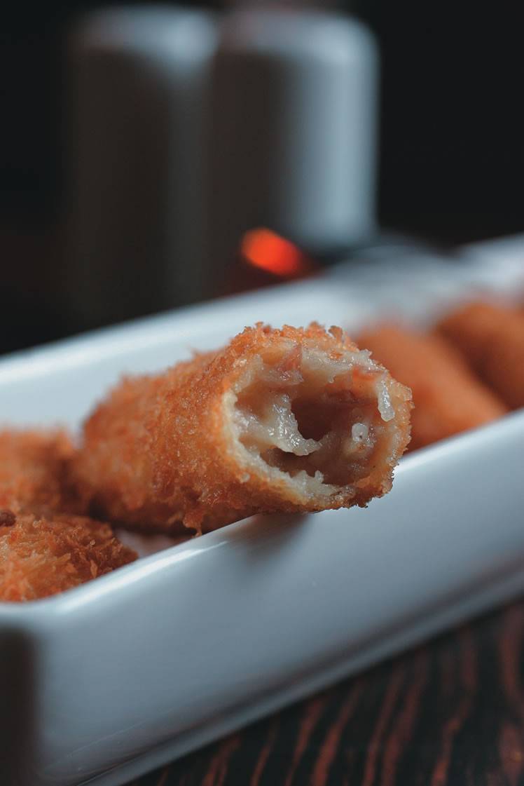 A croqueta de presunto cru com gruyère