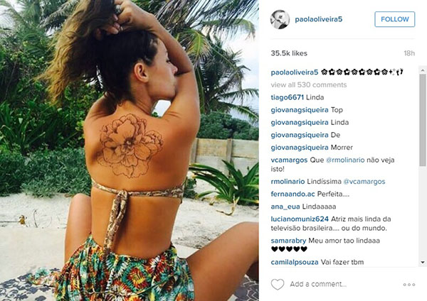 Paolla Oliveira publica foto com tatuagem gigante nas costas e fãs da atriz questionam se desenho é de verdade
