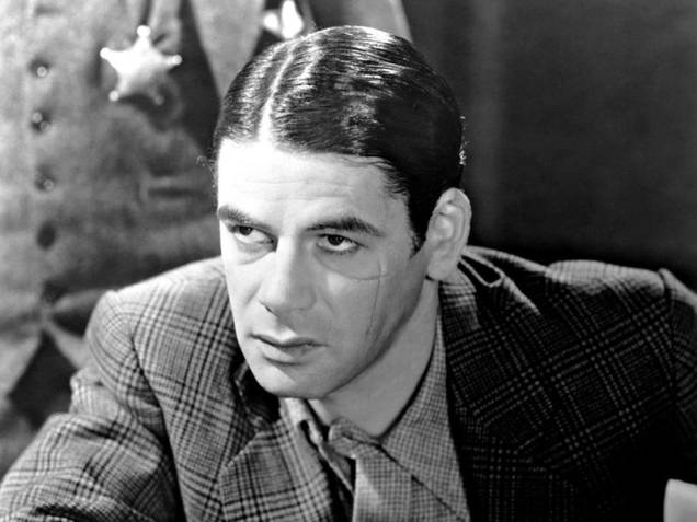 Paul Muni em Scarface - A Vergonha de uma Nação: na abertura