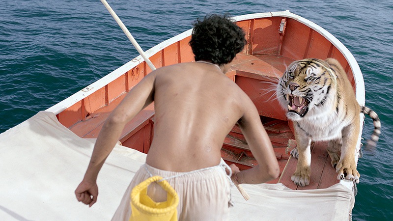 As Aventuras de Pi o ator Suraj Sharma e o tigre digital