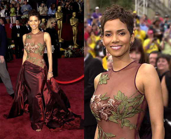Halle Berry veste Ellie Saab no Oscar de 2002 Há uma linha tênue entre mostrar um pouco de pele e "Hello, muita informação", mas Halle Berry conseguiu encontrar um meio termo. Com uma pitada de flores e uma saia ameixa enorme do designer Elie Saab, Halle garantiu que seu vestido ficasse do lado menos vulgar. (Foto: Reprodução)