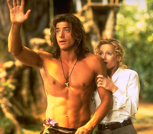 Brendan Fraser e Leslie Mann em George - O Rei da Floresta: aventura lançada em 1997