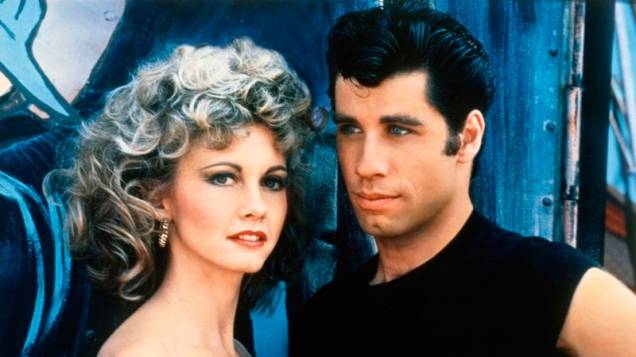 Grease - Nos Tempos da Brilhantina: Danny (John Travolta) e Sandy (Olivia Newton-John) Grease - Nos Tempos da Brilhantina: Danny (John Travolta) e Sandy (Olivia Newton-John)