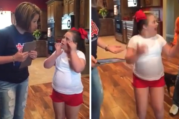 Garotinha adorável comemora a realização do sonho de ser líder de torcida