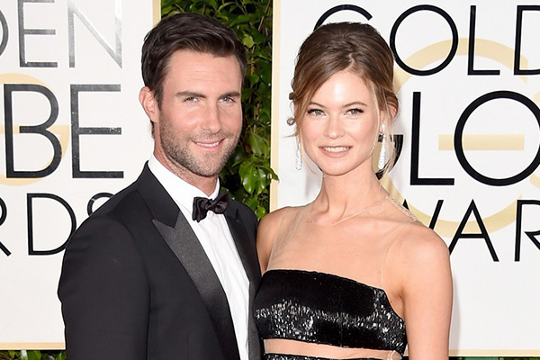 BEVERLY HILLS, CA - JANUARY 11: Singer Adam Levine and model Behati Prinsloo attend the 72nd Annual Golden Globe Awards at The Beverly Hilton Hotel on January 11, 2015 in Beverly Hills, California.  (Photo by Jason Merritt/Getty Images)