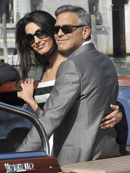 O galã e sua esposa, Amal Alamuddin, em Veneza