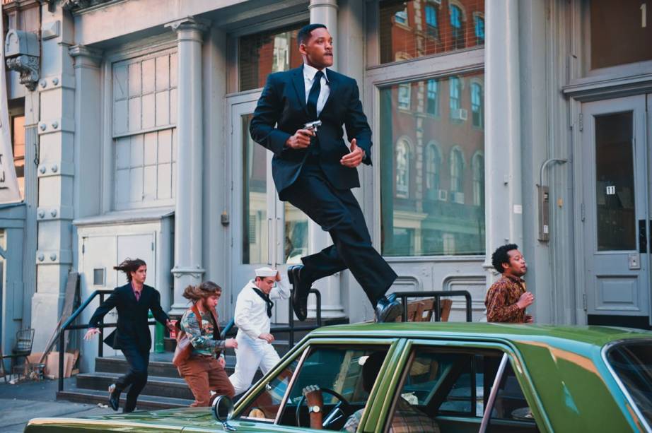 Will Smith como o Agente J: o personagem  retorna a 1969 na comédia de ﬁcção cientíﬁca Homens de Preto 3