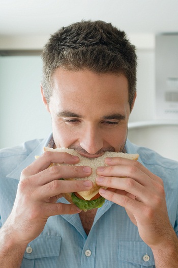 Man eating sandwich