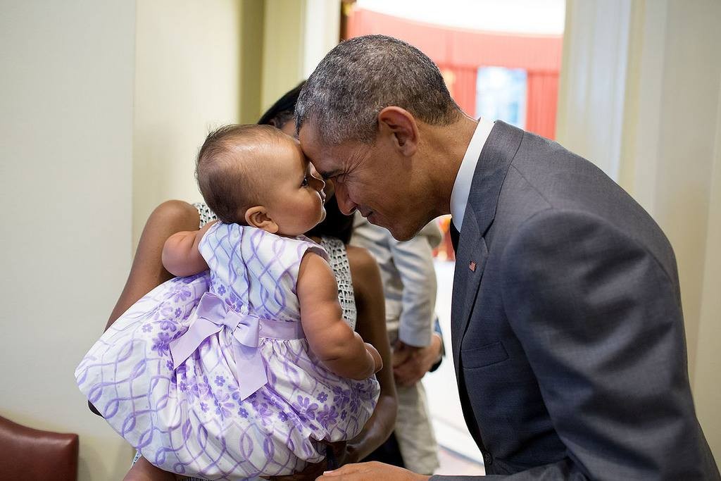 Barack Obama com bebê (Foto: Reprodução)