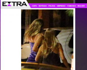A filha de Xuxa, de apenas 16 anos, se afasta quando nota a presença de fotógrafos. Foto: Reprodução Jornal Extra