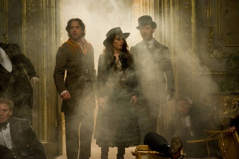 Robert Downey Jr., Noomi Rapace e Jude Law em Sherlock Holmes: O Jogo de Sombras: filme promete ação para diferentes idades