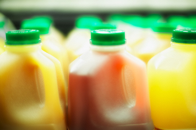 Bottled Fruit Juice --- Image by © Ken Kaminesky/Take 2 Productions/Corbis