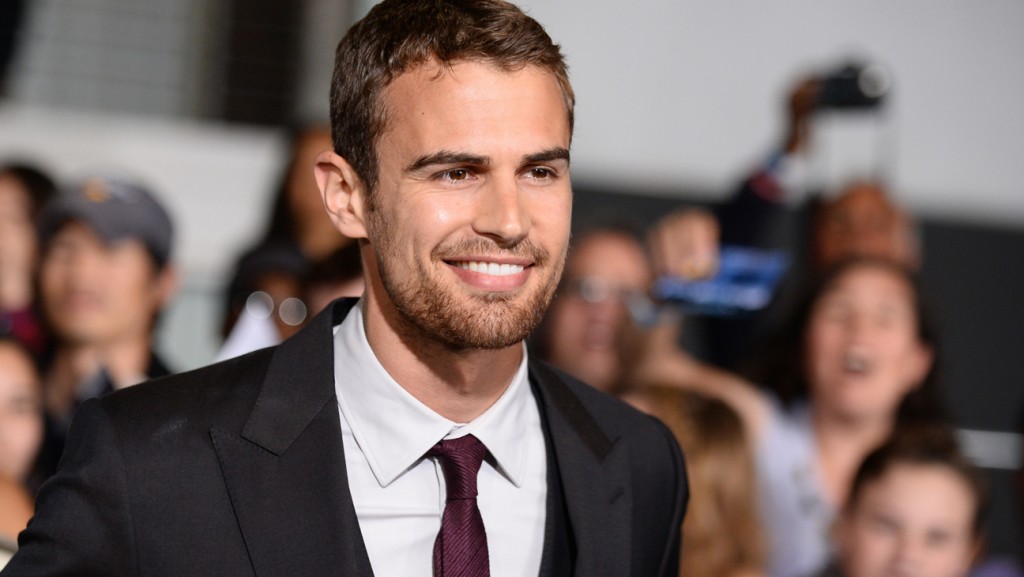 Theo James arrives at the world premiere of "Divergent" at the Westwood Regency Village Theater on Tuesday, March 18, 2014, in Los Angeles. (Photo by Jordan Strauss/Invision/AP)
