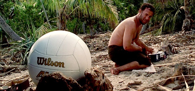 A bola Wilson e Tom Hanks em cena de Náufrago (2000)