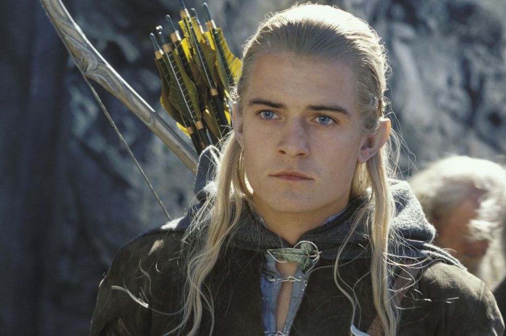 Orlando Bloom: ator interpretou Legolas em 'O Senhor dos Anéis - A Sociedade do Anel' e aparece com cabelos brancos e olhos claros em cena do filme.