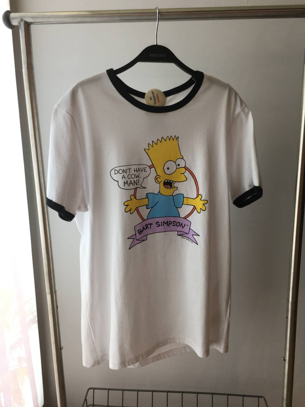 Camiseta masculina com estampa do Bart, dos Simpsons. R,50