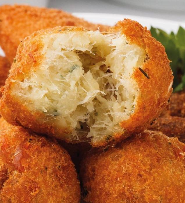 <span>Bolinho de bacalhau da </span><a href="https://vejasp.abril.com.br/estabelecimento/tasca-do-ze-da-maria/">Tasca do Zé e da Maria</a>