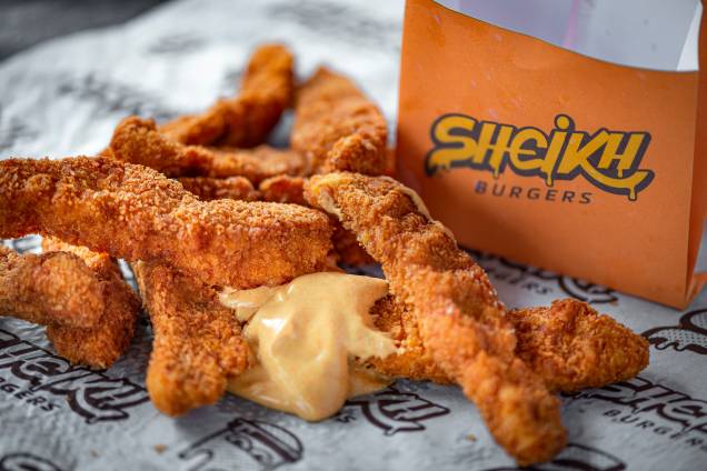 Porção de nuggets: acompanha molho Porção de nuggets: acompanha molho