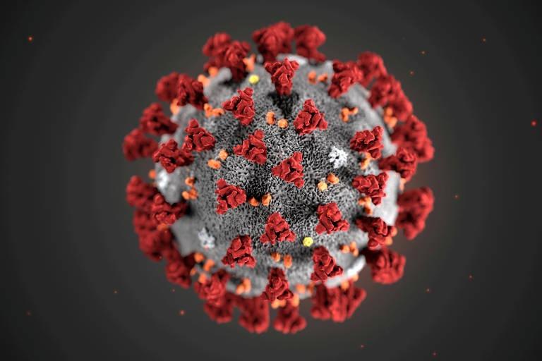 Imagem mostra representação gráfica do vírus da Covid-19: uma esfera cinza com "espinhos" vermelhos.