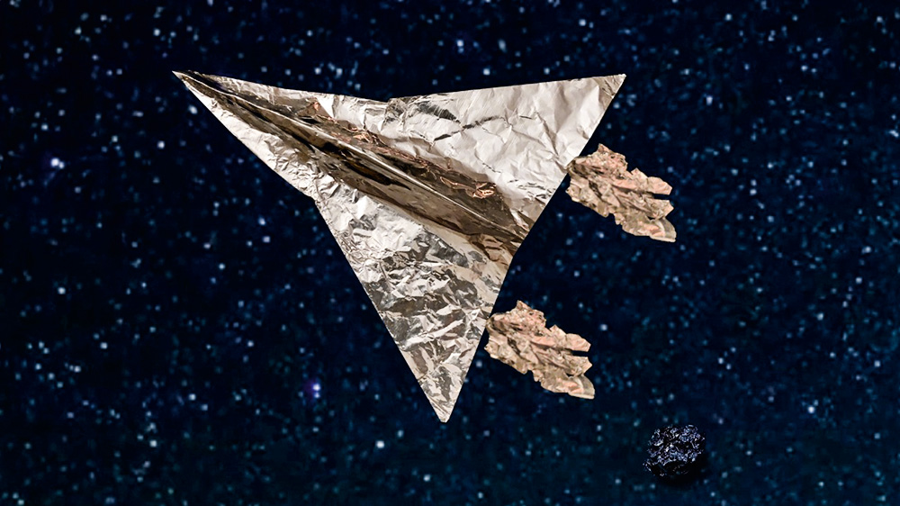 Nave espacial feita com papel alumínio em fundo feito digitalmente sobrevoa por estrelas