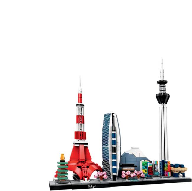 Uma maquete em Lego de Tóquio. Há prédios, uma torre, árvores com folhas rosas e casinhas