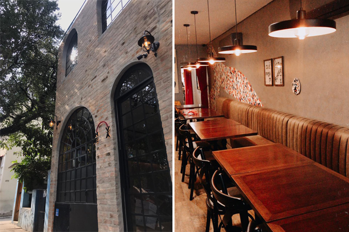 Me.Vá Duas imagens verticais do restaurante Me.Vá unidas por linha fina branca. À esquerda, fachada em estilo medieval. À direita, salão com mesas e banco estofado contínuo.