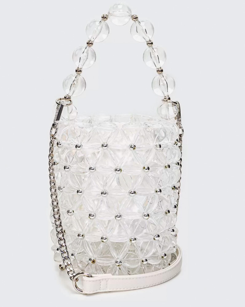 acrílico.png Bolinhas de acrílico unidas formam uma bolsa, com formato de