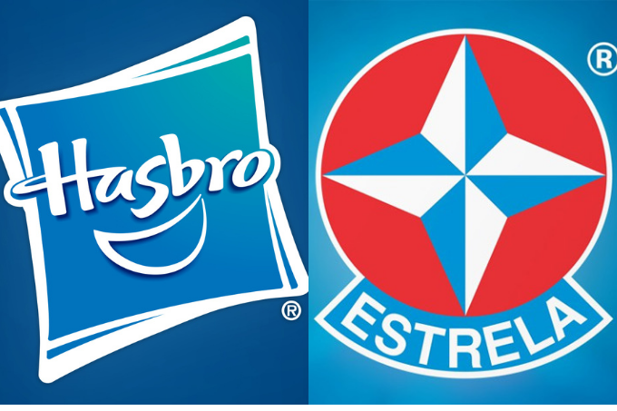Dois logos, um do lado do outro. O na esquerda é azul e está escrito "Hasbro", com um sorriso embaixo do nome. O da direita mostra uma rosa dos ventos azul, branca e vermelha com o nome "Estrela" embaixo.