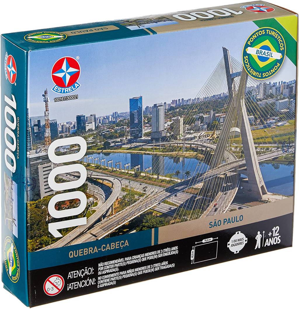 A caixa de um quebra-cabeça. A foto é um retrato de São Paulo, onde mostra a Ponte Estaiada