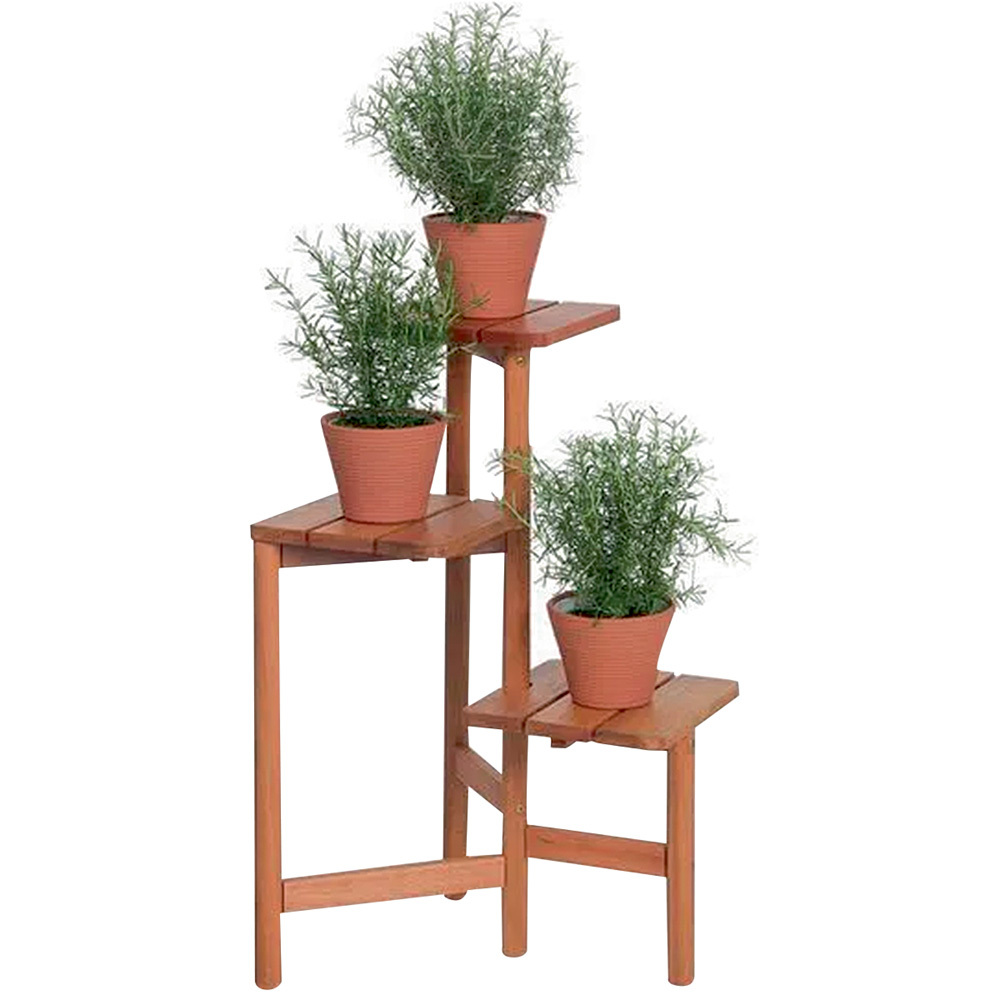 vasos.png Um móvel tem três andares em escadinha. Em cada um deles, há um vaso de plantas marrom, assim como o móvel
