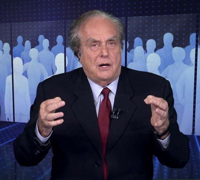 A imagem mostra Arnaldo Jabor como comentarista no Jornal da Globo