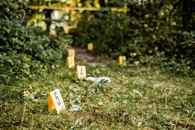 Yellow Crime Scene Markers Next to Physical Evidence