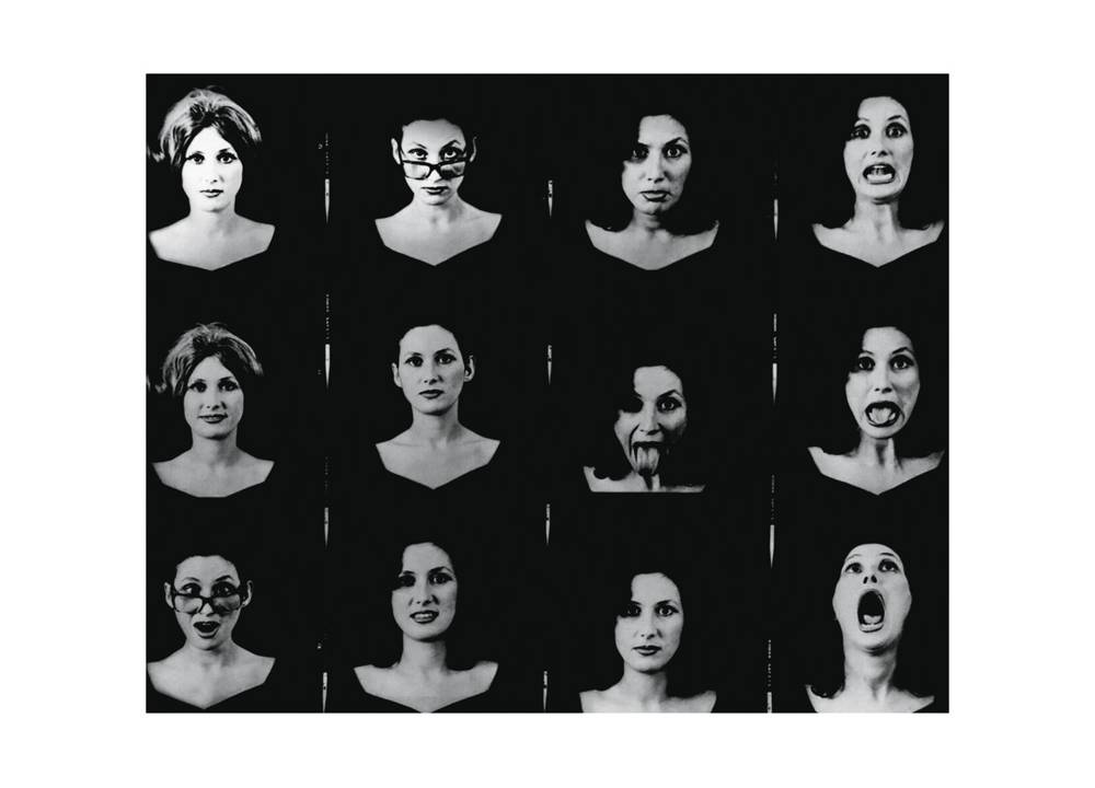 Obra de Gretta Sarfaty. O mural mostra várias fotos em preto e branco de mulheres com várias expressões faciais diferentes.