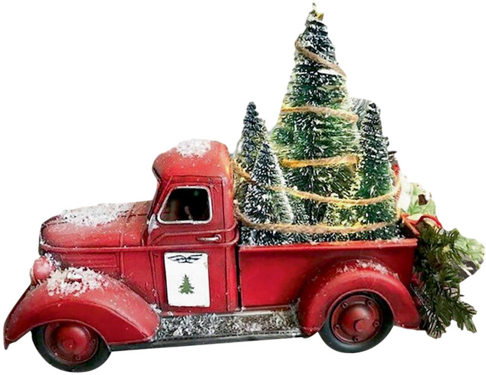 Um caminhão de decoração com árvores de Natal