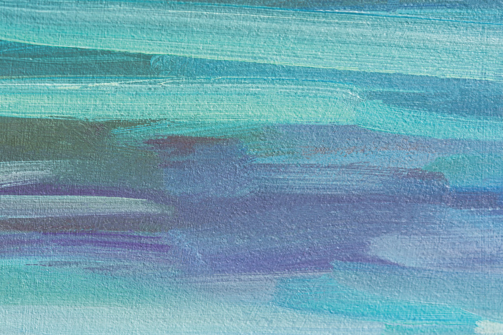 Imagem abstrata mostra tons de azul e roxo em tinta.