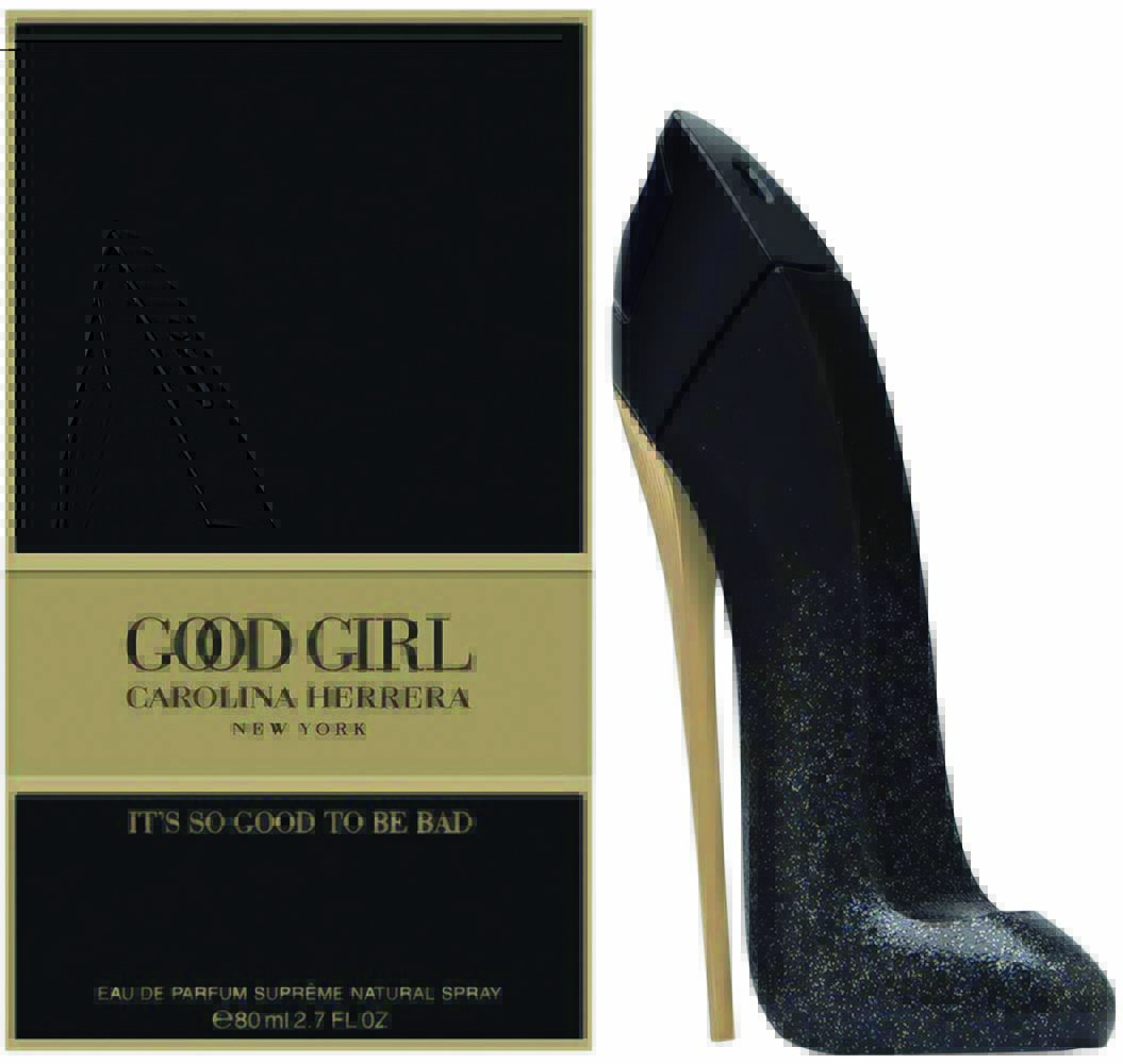 Perfume em frasco preto brilhante em forma de sapato de salto fino. A caixa está ao lado, é preta e tem detalhes em dourado