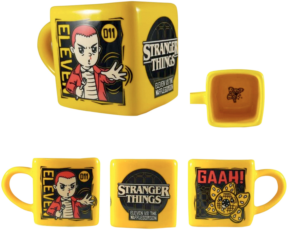 Caneca amarela e quadrada inspirada em Stranger Things. A estampa possui uma ilustração da Eleven e dos monstros da primeira temporada