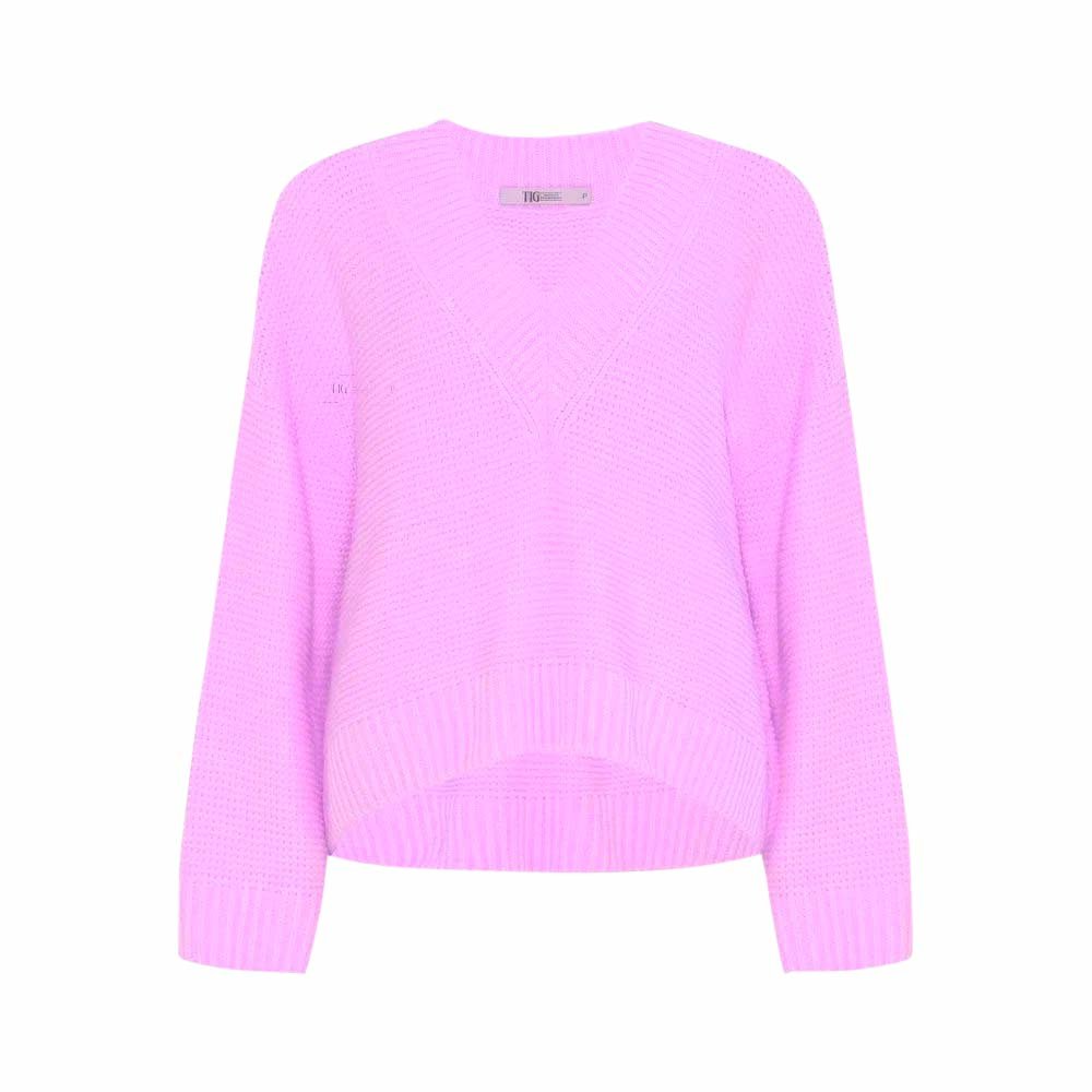 Imagem mostra blusa rosa de tricot
