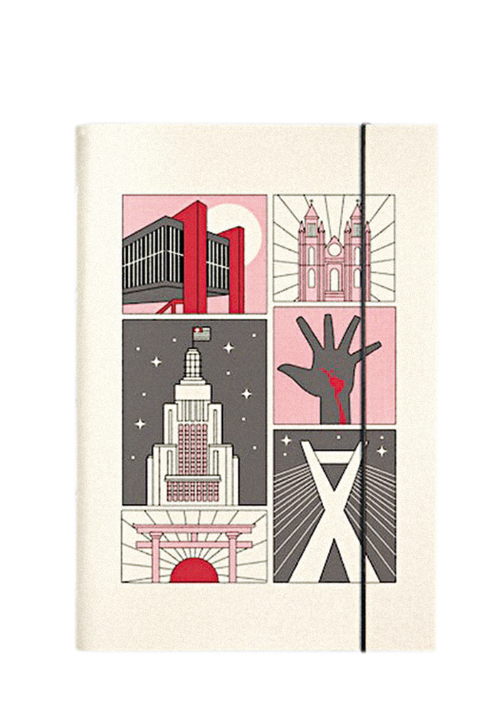 Caderno de anotações com capa branca com ilustrações de pontos arquitetônicos importantes de São Paulo, como o Masp e o Memorial da América Latina