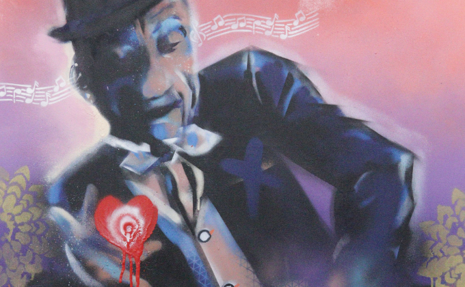 Imagem mostra pintura de homem de terno, com um coração pintado sobre seu peito
