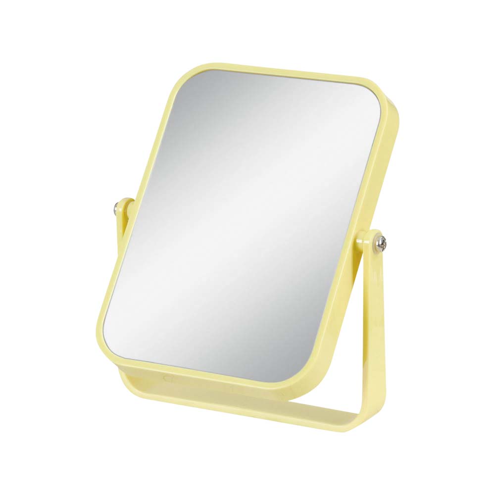 espelho de mesa retangular com pontas arredondadas. a cor é um amarelo claro