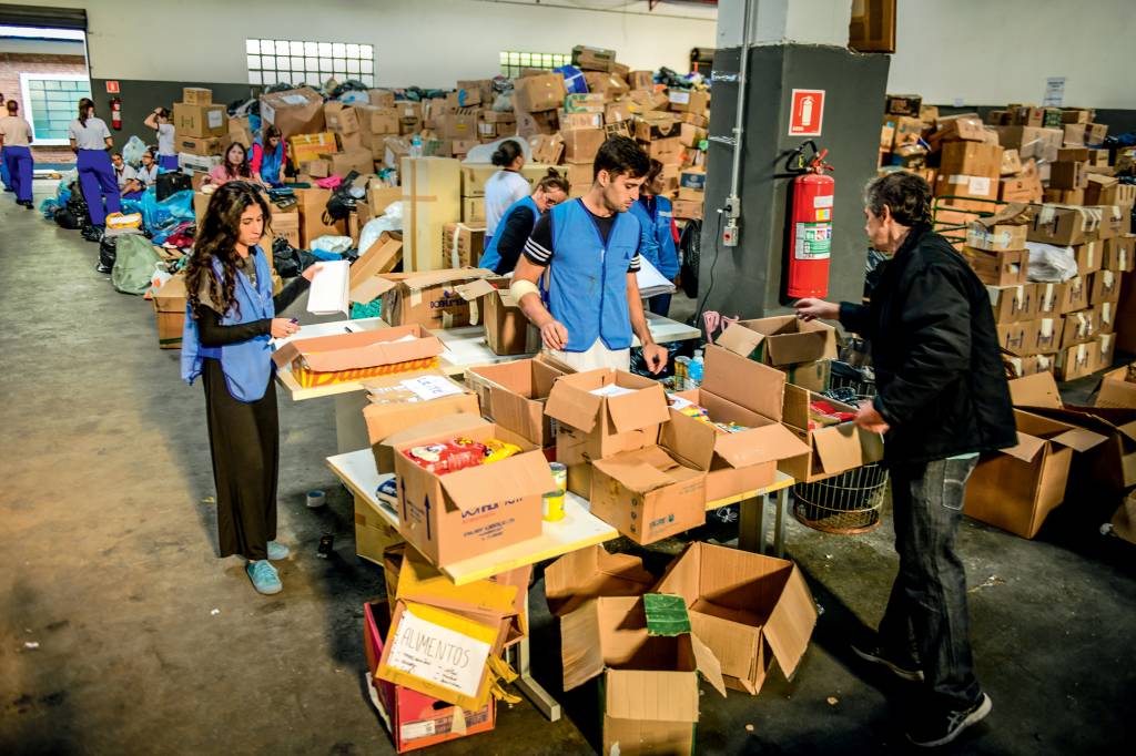 Repórter da Vejinha se voluntaria em ações humanitárias na capital