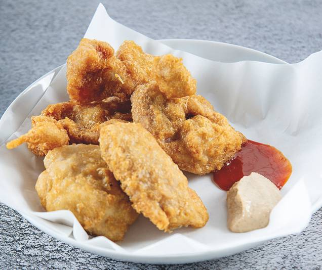 No cardápio: petiscos como o frango frito