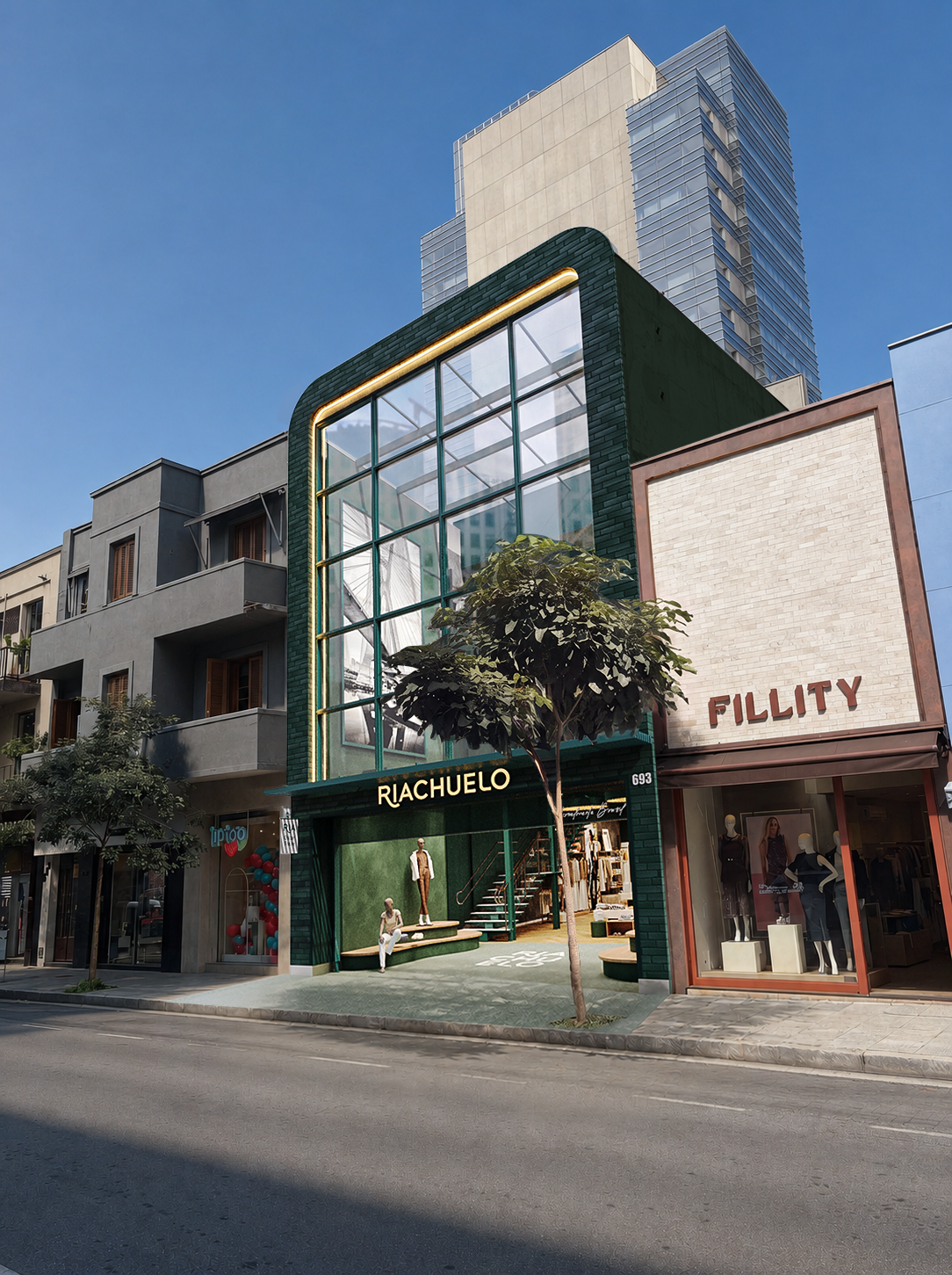 Fachada da loja Riachuelo em verde escuro com grandes janelas de vidro, letreiro dourado e manequins na vitrine. Ao lado, a loja Fillity com fachada de tijolos claros e manequins. À esquerda, prédios residenciais cinzas e uma rua vazia sob céu azul